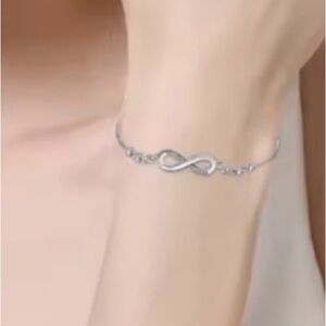 Sterling Silver Infinity Bracelet with Cubic Zirconia - Silver